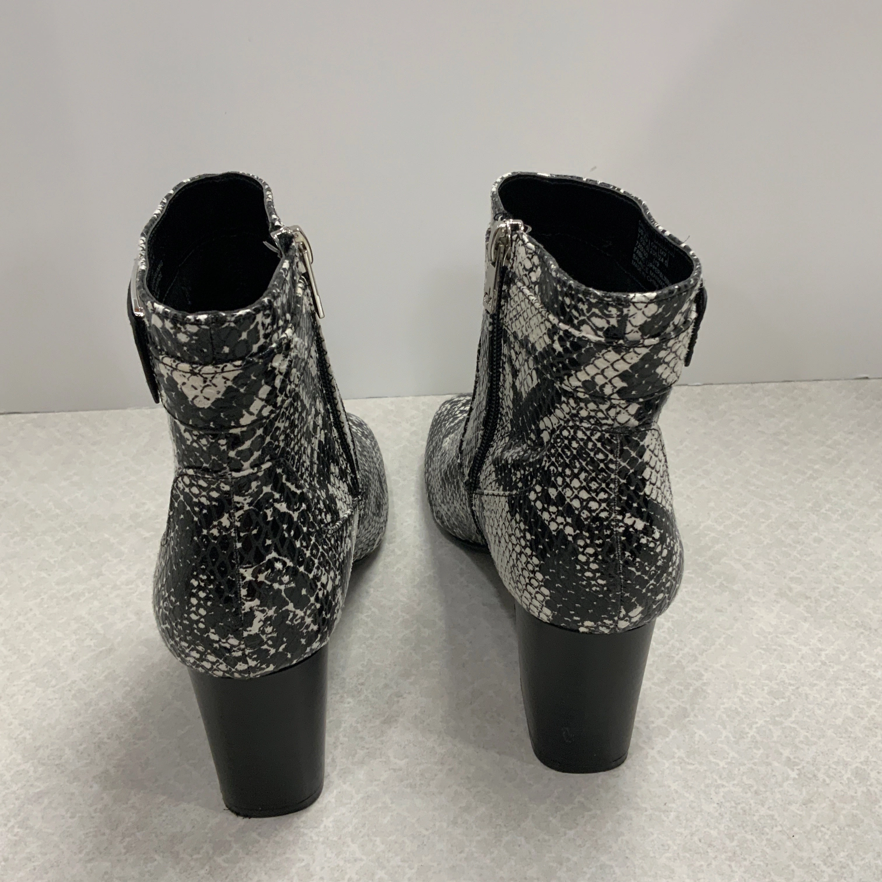 Boots Ankle Heels By Calvin Klein In Black, Size: 7.5