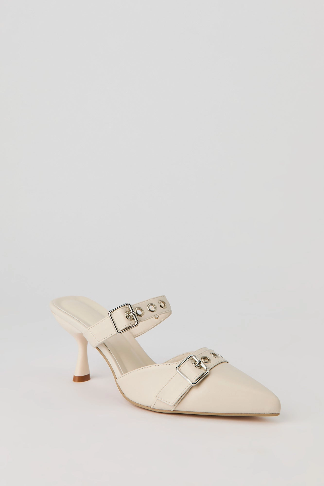 Mules à bout pointu avec boucle